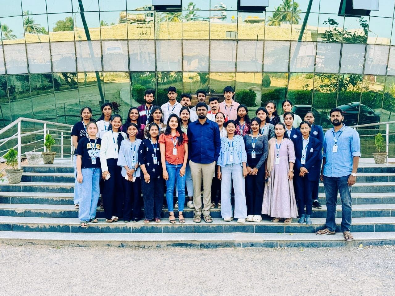 An intern batch on the office steps