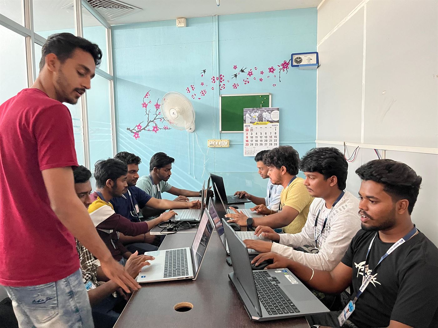 A mentor guiding interns